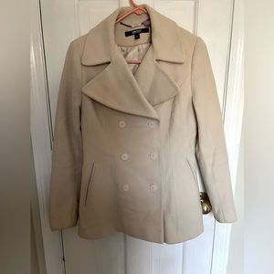 DKNY jacket in off white.